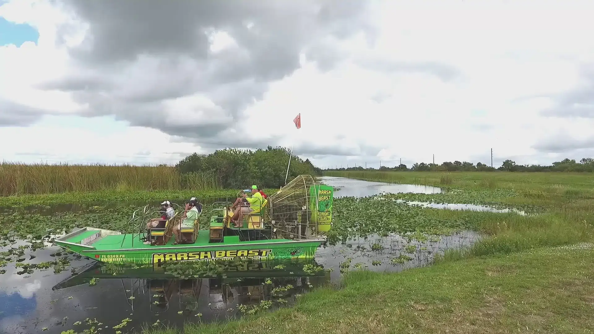 Marsh Beast airboat gliding through Florida wetlands at Blue Cypress Conservation Area near Vero Beach